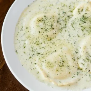 Cheese ravioli in creamy sauce at Jonny's Pizza in Aubrey and Frisco, TX
