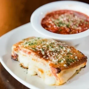 Sliced stromboli with marinara at Jonny's Pizza in Aubrey and Frisco, TX